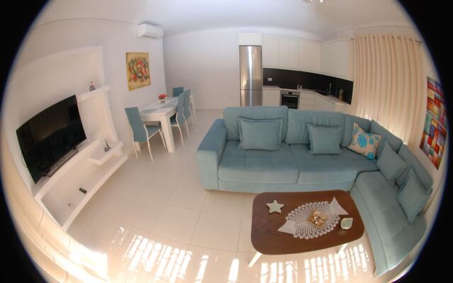 White Deluxe Apartments