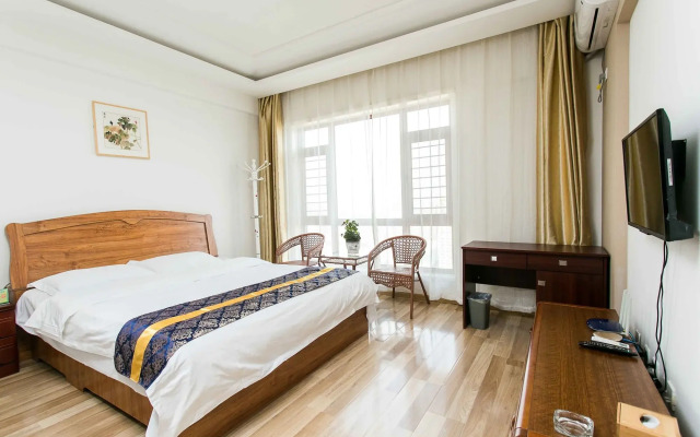 Dalian Bo Ke Business Apartment