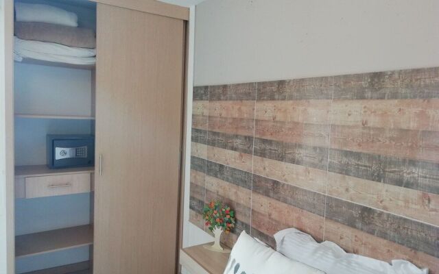 Apartasuites Laureles Cmc