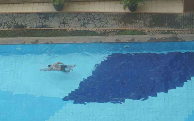 Comfy 3BR Apartment at Green Palm Residences By Travelio