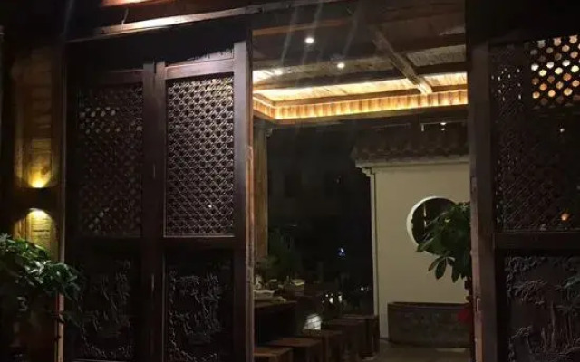 Sansheng Garden Inn (Puzhehei Xianrendong Shop)