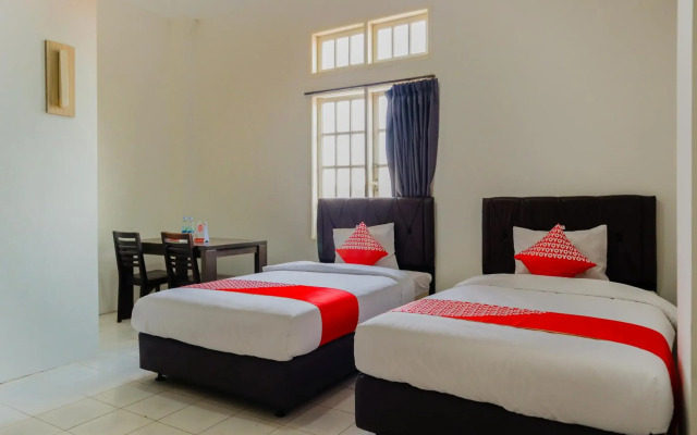 OYO 1111 Pasar Baru Inn