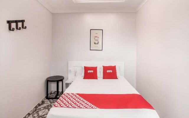 Oyo 122 Tiquatira Hotel