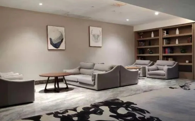 Manju Hotel (Huzhou Zhili Chinese children's wear city)