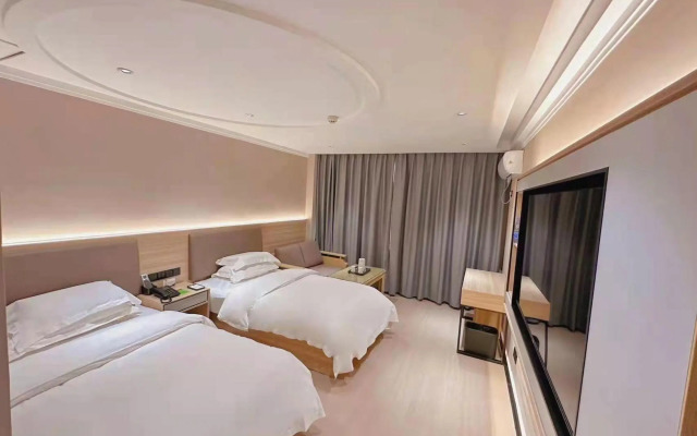 Wanjia Business Hotel (Zaozhuang Maoyuan)