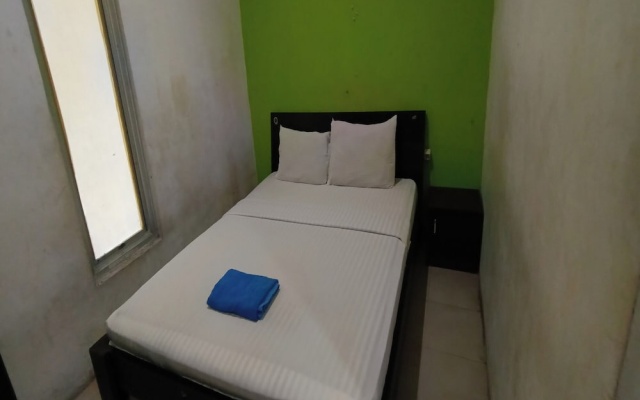 Hotel O Azwa Gh Katingan Near Lapangan Sepak Bola Pegatan Hilir – Guest Rooms – Pagatan Hilir