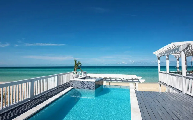 Secluded Luxury: New Beachfront Home With Pool