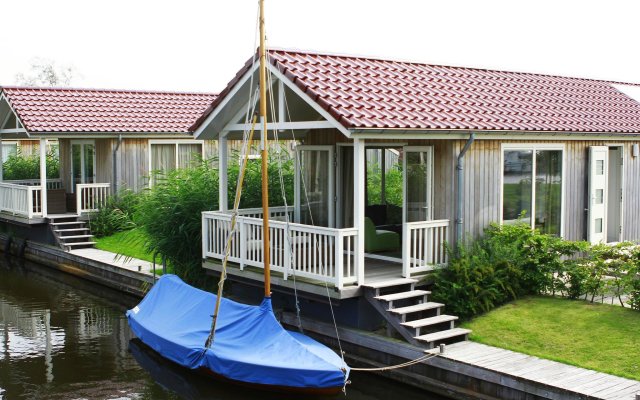 Cozy Chalet Right on the Water in Friesland