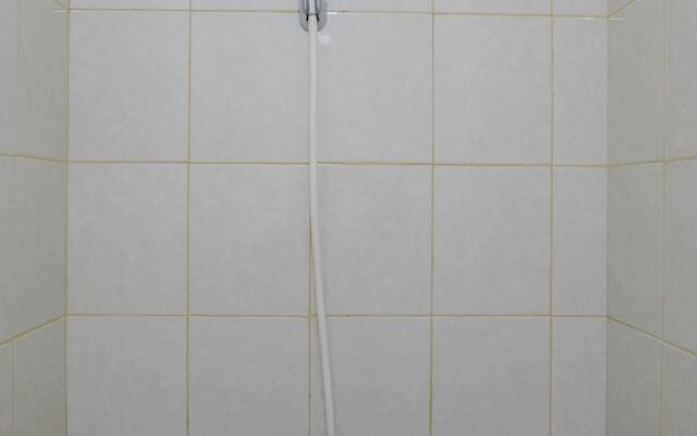 Simple Studio Room at Poris 88 Apartment