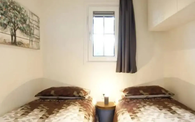 Nice Chalet in a Holiday Park