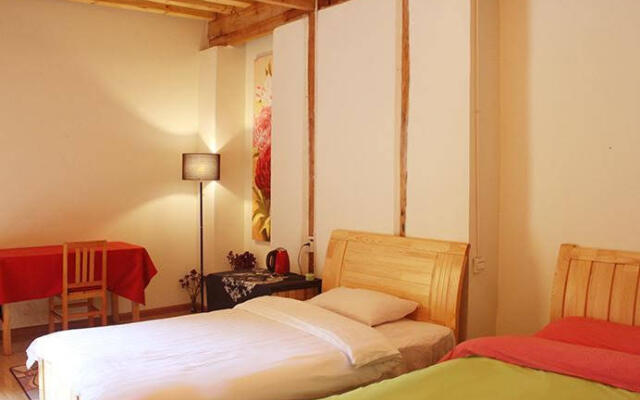 Lijiang Hefenghut Inn