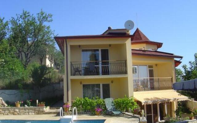 Part of the house in the apple garden