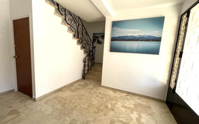 Appartement spacieux 4 chambres, jardin, proche centre-ville