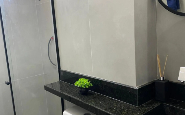 Apartamento novo ao lado do Rio Centro!