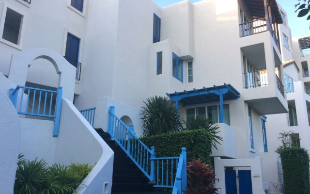 The Che Pool Access Beachfront Condo by Away