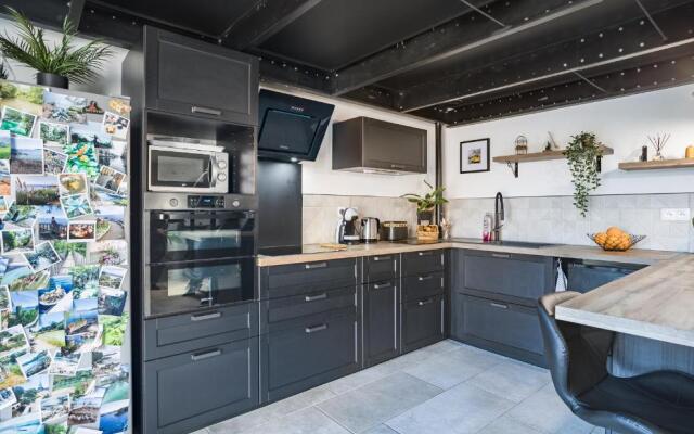 Loft avec jardin et parking privé