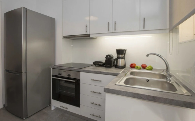 Acropolis View Penthouse Apartment by GHH