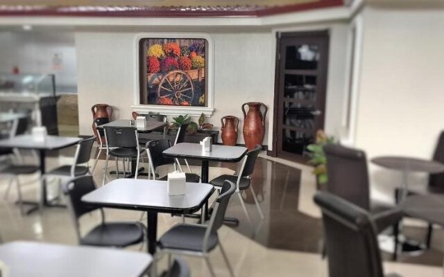Prado Inn & Suites