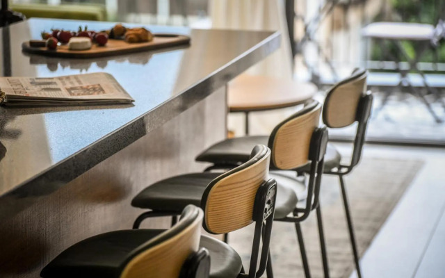 Stylish 2BR Apartment with Balcony and Urban View