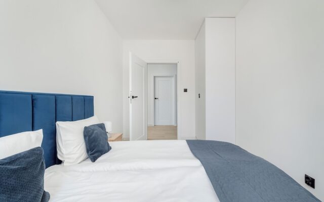 Wroclaw Dark Blue Apartment by Renters