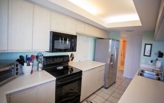Cozy Condo with Gorgeous View of the Beach and Gulf by RedAwning