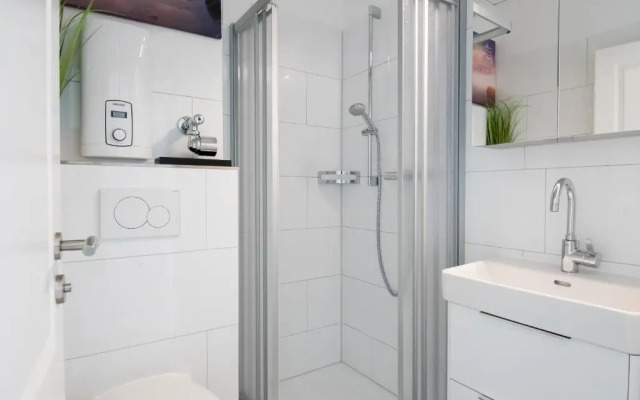 Badeweg 4 Sandkorn 1