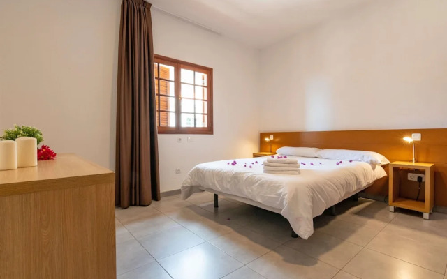 Casa de vacaciones con piscina compartida en Mogán IV