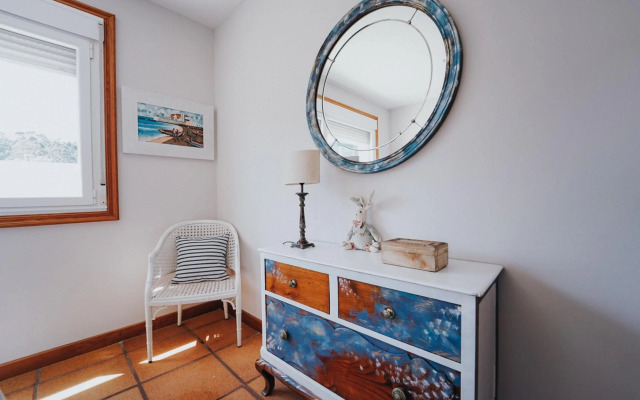 Villa con piscina a pie de playa