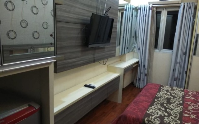 Apartment The Suites Metro by Herlan
