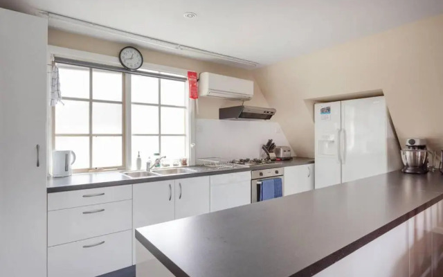 Upstairs Studio Apartment with street access