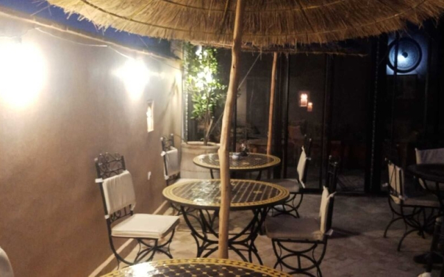 "room in Guest Room - Riad Lakouas Triple Room With Pool View"
