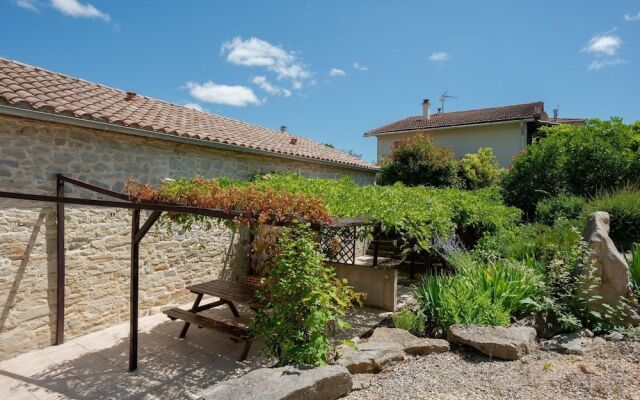 3 cottages around a swimming pool in a small village