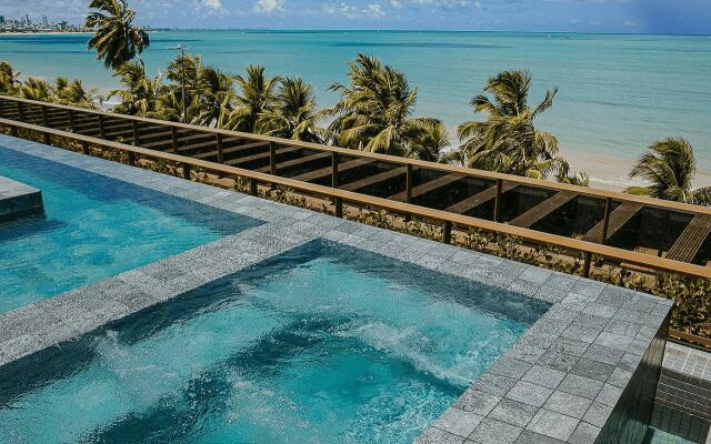 Unity #420 - Apartamento beira mar por Carpediem