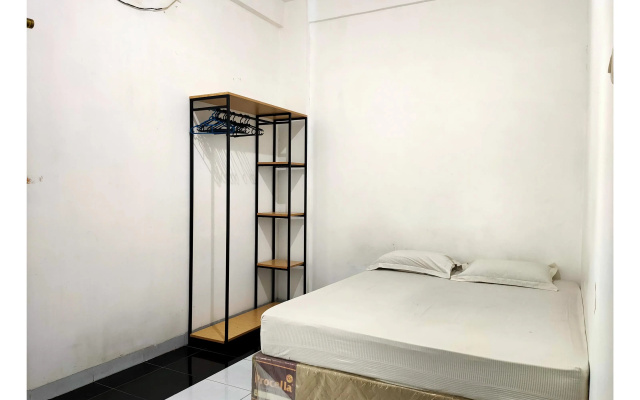 Hotel O Wisma Aluh AmbakNearPantai batu lima Asbullah tmbngn – Guest Rooms – Batu Tungku