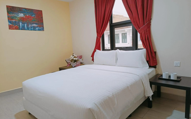 Capital O 90897 Island City Hotel