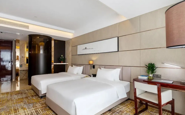 Xingyi Chain Hotel Jiangxia Metro Station