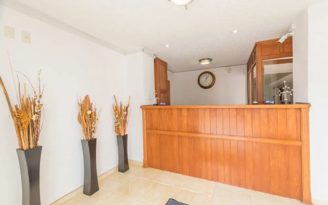 Suites Poliforum Inn