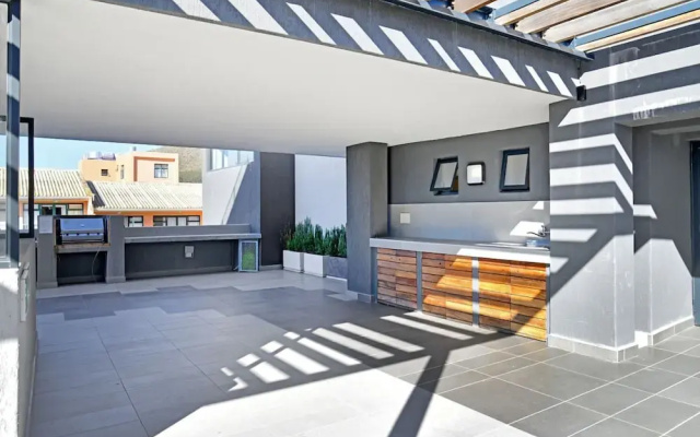 Modern Sea Point Apartment Rooftop Pool