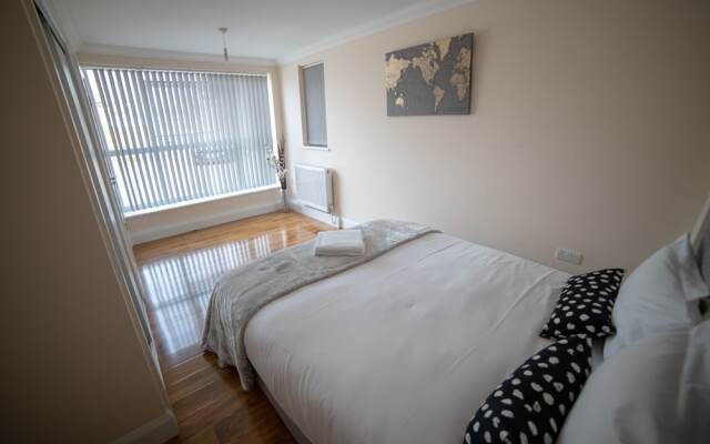 The Coach House by Riis Property