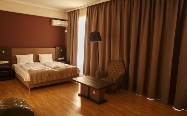 Olympus Hotel By Umbrella
