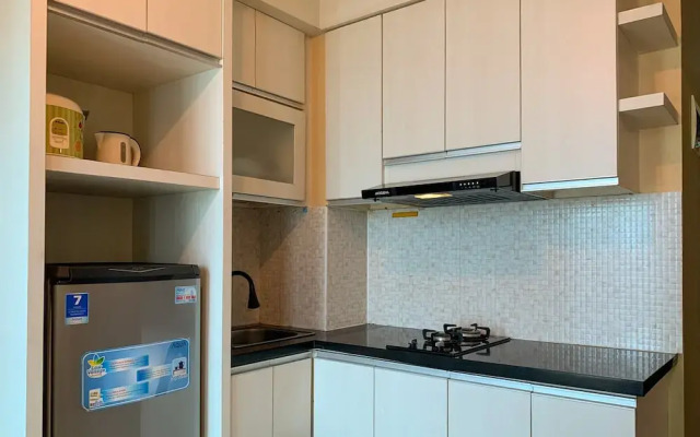 Warm And Cozy 2Br At Tifolia Apartment