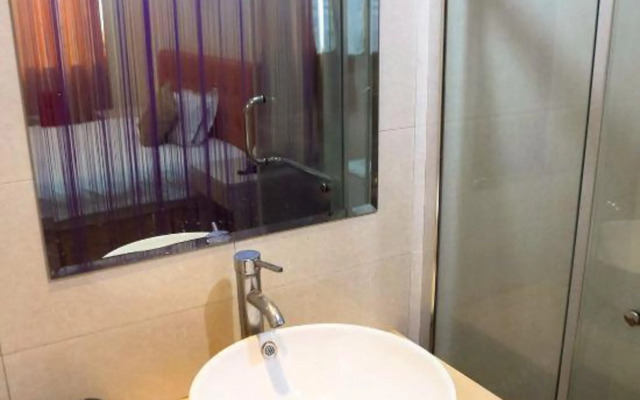 Paojiang Xinyuansu Business Hotel