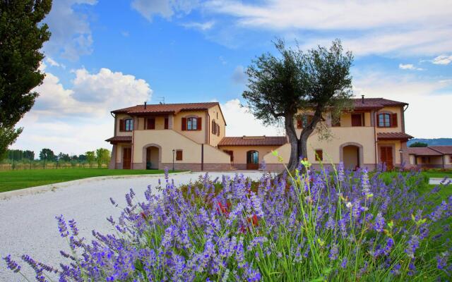 An agritourism complex with views of Assisi.