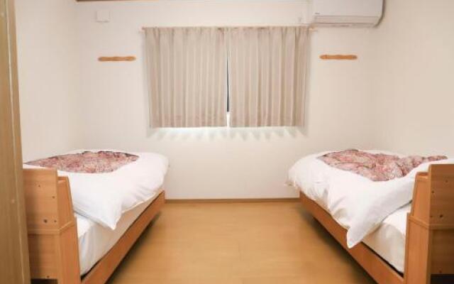 Guest House En