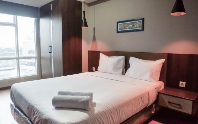 Classy 1BR Apartment with Pool View at Grand Sungkono Lagoon