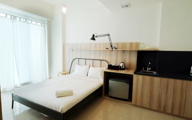 Classic Studio Tree Park Apartment near ICE BSD By Travelio