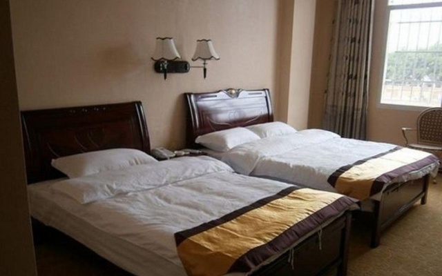 Xishuangbanna Xinhai Hotel – Guest Rooms – Xishuangbanna