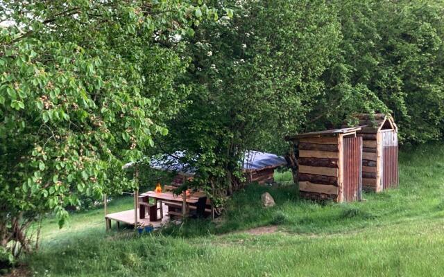 Wood Cabin & 4 Large Bell Tents - Hapus Hideaway