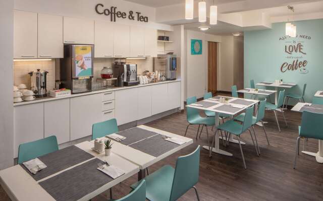 Escala Hotel & Suites