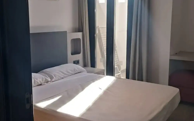 Belvilla by OYO Apartamento con Patio